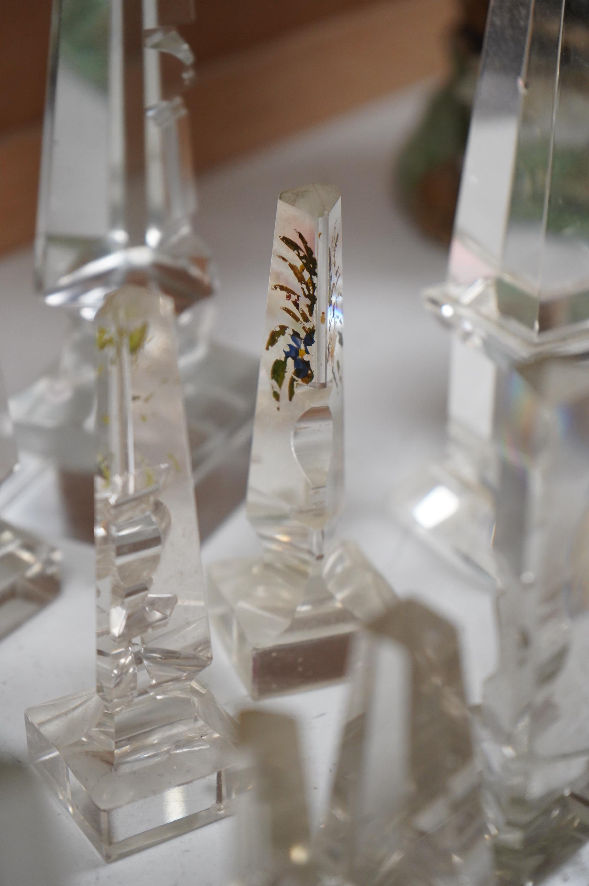 Twelve Victorian glass deceptive obelisks, and two later glass obelisk ornaments, largest pair 21cm high
